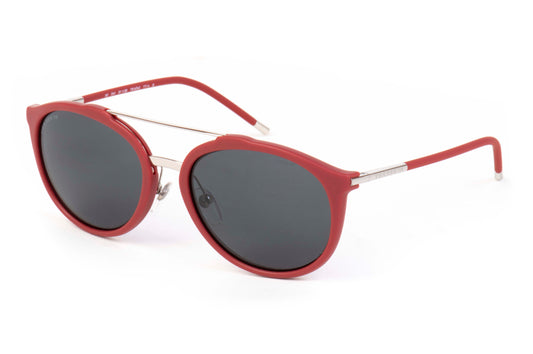 Red sunglasses with dark lenses on a white background