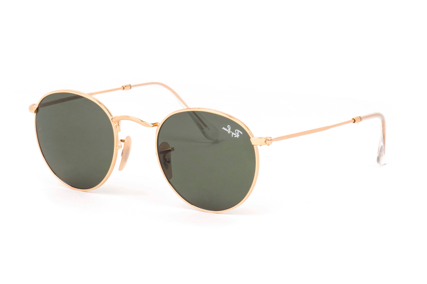 Round sunglasses with gold frame and green lenses on a white background